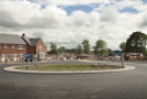 New roundabout completed and first dwellings under construction at Bowbrook, June 2015